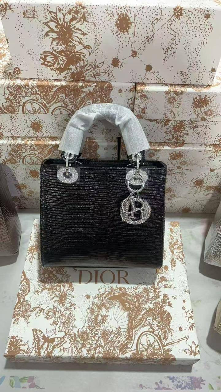 Lady Dior rare materials
Size : 18 * 14 * 7 cm
120 dhs🇦🇪
with box 
🎁🎁🎁
Zain115
♥️♥️♥️