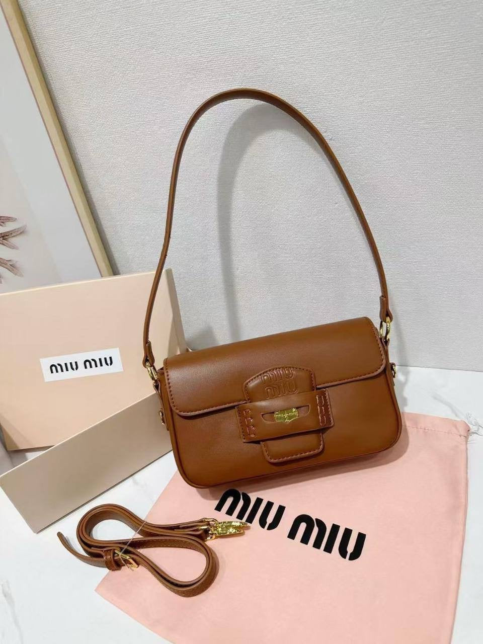MIU MIU
23*13.5*5cm
With box 
🎁🎁🎁
90 dhs🇦🇪
Zain17
♥️♥️♥️