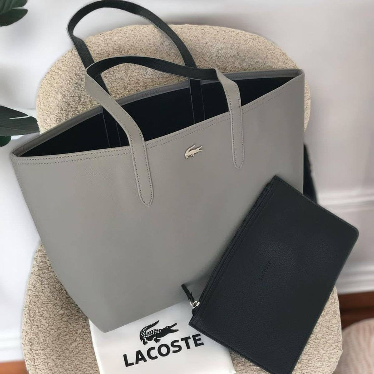 Lacoste
New crocodile double bread, 
good quality, 
size 46 * 30 cm 
75 dhs🇦🇪
Zain12
♥️♥️♥️
