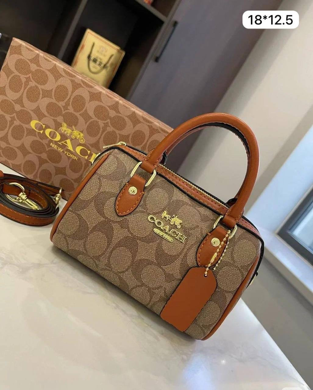Coach Rowan
Small Size : 18 * 12.5 cm
90 dhs🇦🇪
with box 
🎁🎁🎁
Zain115
♥️♥️♥️