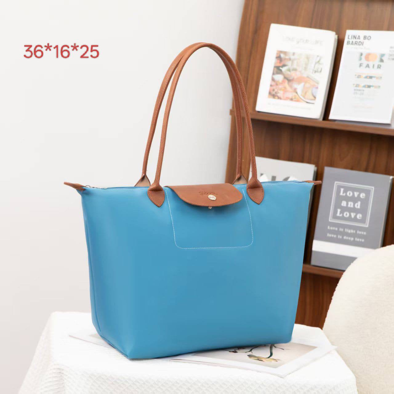 LONGCHAMP 
 hand bag
size: 36*14*25 
45 dhs🇦🇪
Zain40
♥️♥️♥️