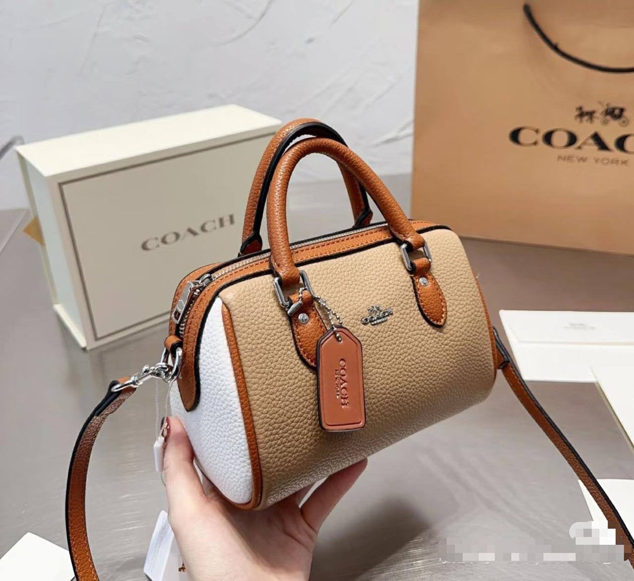 Coach Rowan
Small Size : 18 * 12.5 cm
90 dhs🇦🇪
with box 
🎁🎁🎁
Zain115
♥️♥️♥️
