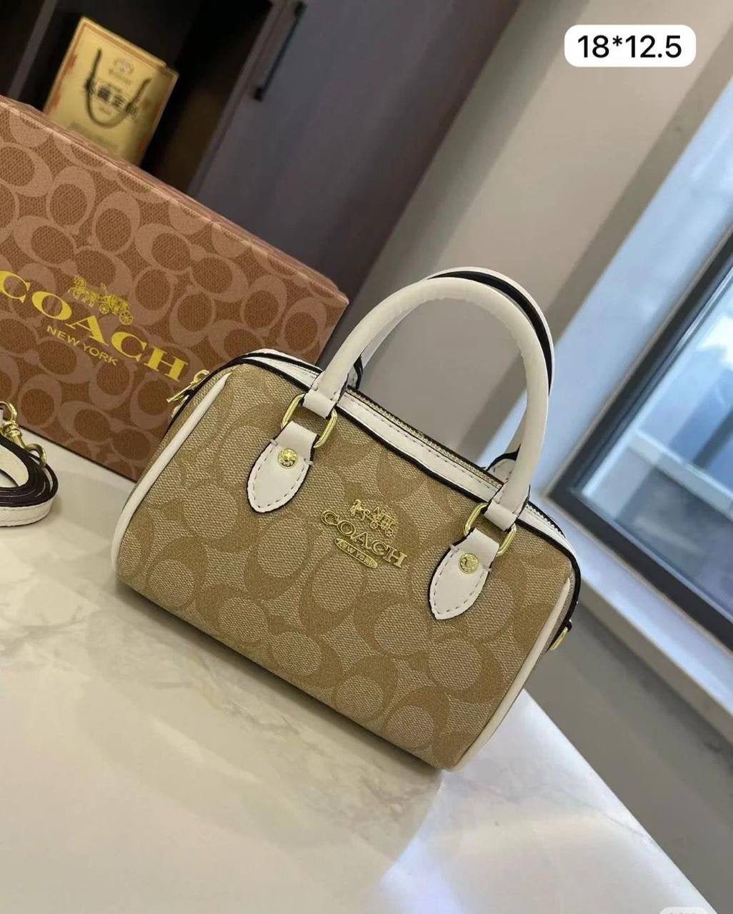 Coach Rowan
Small Size : 18 * 12.5 cm
90 dhs🇦🇪
with box 
🎁🎁🎁
Zain115
♥️♥️♥️