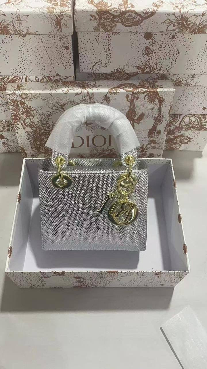 Lady Dior rare materials
Size : 18 * 14 * 7 cm
120 dhs🇦🇪
with box 
🎁🎁🎁
Zain115
♥️♥️♥️