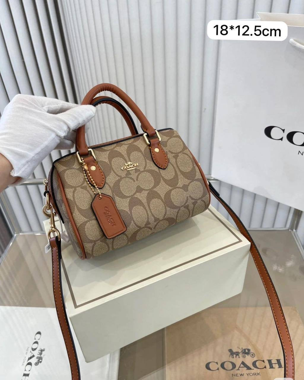 Coach Rowan
Small Size : 18 * 12.5 cm
90 dhs🇦🇪
with box 
🎁🎁🎁
Zain115
♥️♥️♥️