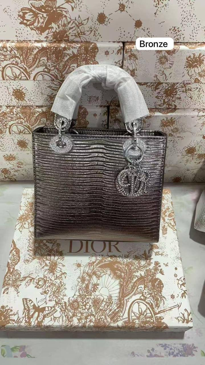 Lady Dior rare materials
Size : 18 * 14 * 7 cm
120 dhs🇦🇪
with box 
🎁🎁🎁
Zain115
♥️♥️♥️