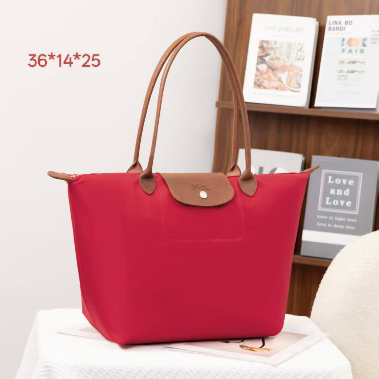 LONGCHAMP 
 hand bag
size: 36*14*25 
45 dhs🇦🇪

Zain40
♥️♥️♥️