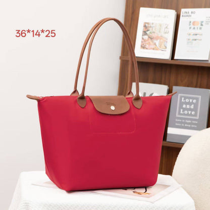 LONGCHAMP 
 hand bag
size: 36*14*25 
45 dhs🇦🇪

Zain40
♥️♥️♥️