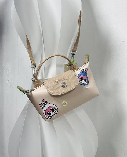 Labubu＋LongChamp 
Size：20 * 10 * 5 cm
55 dhs🇦🇪

Zain115
♥️♥️♥️