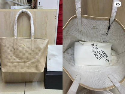🌟 LACOSTE 🐊 New 2 in 1
Double-sided usable bag
Size: 47 * 29 cm
95 dhs🪙

Zain115
♥️♥️♥️