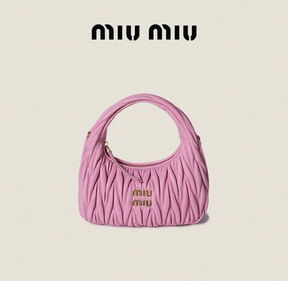 Miu Miu
95 dhs✅
size：20cm
High-quality 

with box
🎁🎁🎁

Zain35
♥️♥️♥️