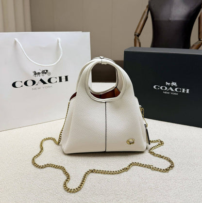 COACH

LanaSMALL 

SIZE NEW 

CAME GOOD QUALITY 

WITH BOX 
100 dhs🇦🇪🇦🇪

Size:20cm

Zain295
Zain39
Zain17
♥️♥️♥️