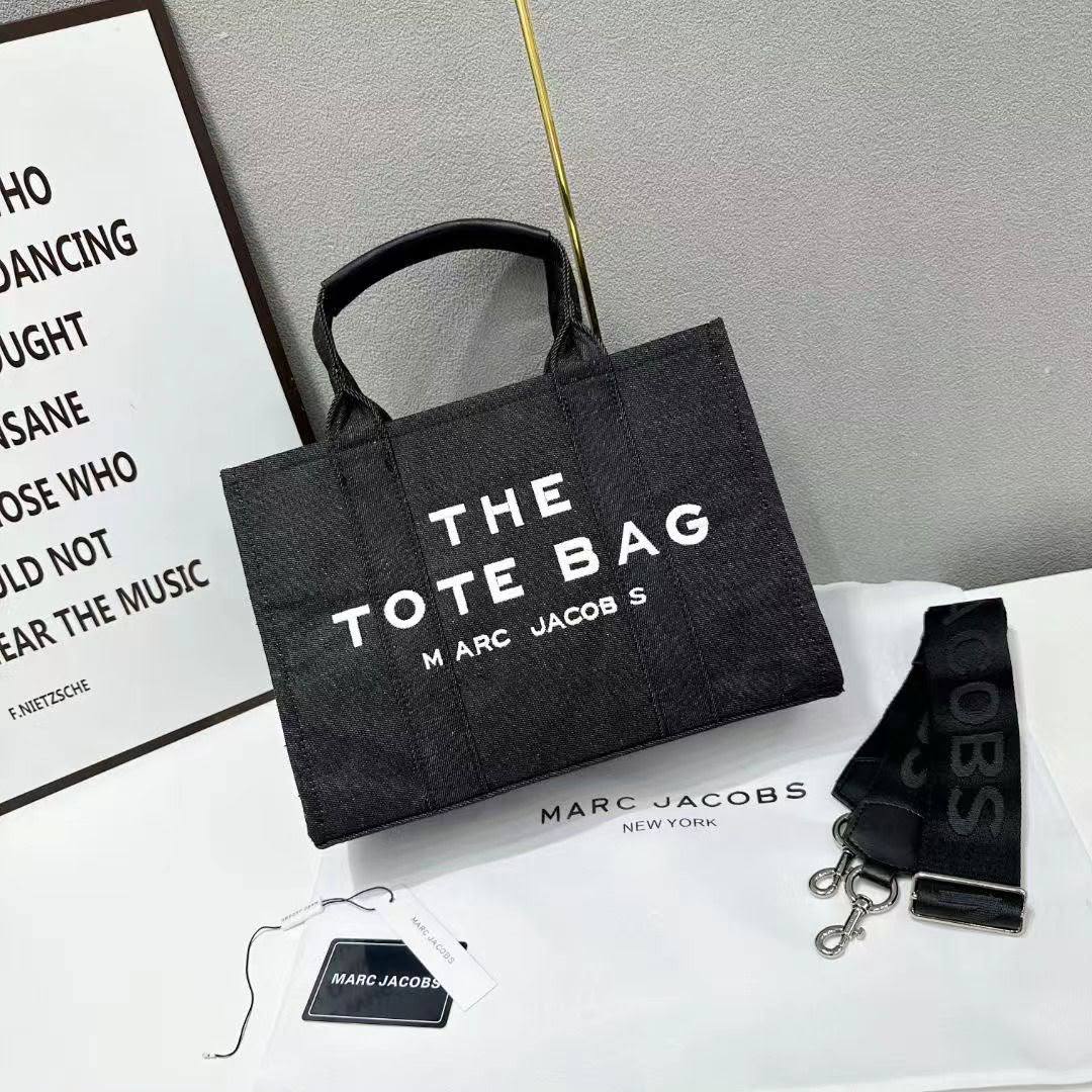 MARC JACOBS 
THE TOTE BAG 
 GOOD QUALITY 
120 dhs💛

Zain39
♥️♥️♥️