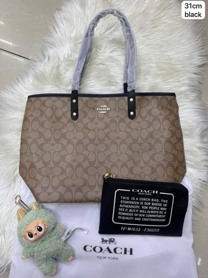 💕 Coach 2 in 1  2️⃣-sided
1️⃣ First quality
Medium Size : 31 * 28 cm
95 dhs✅

Zain115
♥️♥️♥️