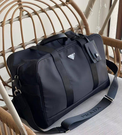 PRADA TRAVELING BAG 
COPY ONE NEW CAME 
150 dhs✅
SIZE: 45 CM

Zain39 
♥️♥️♥️