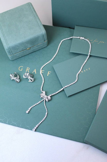 GRAFF
↗️ *Super Master Quality ®️*
Tilda’s Bow Double Strand Round Diamond Necklace with Earings

*260 dhs🇦🇪🇦🇪* with *Good* Box & bag

Zain209
♥️♥️♥️