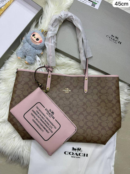 💞 Coach 2 in 1  2️⃣-sided
1️⃣ First quality＋🎁
Big Size : 45 * 30 cm
95 dhs✅
with box 🎁

Zain115
♥️♥️♥️