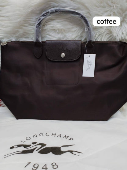 LongChamp 
Hight Quality 
Size: 44*28cm
75 dhs✅

Zain115
♥️♥️♥️