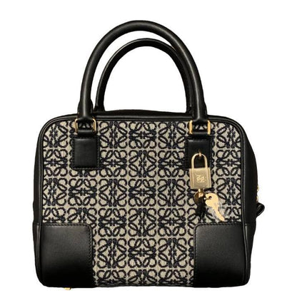 Loewe 
95 dhs✅ 

with box
🎁🎁🎁

Zain235
♥️♥️♥️