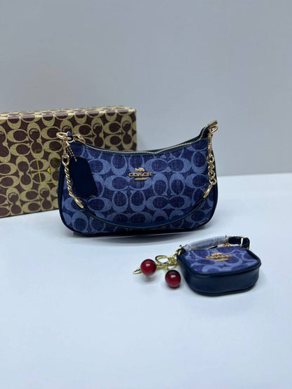 Coach
110 dhs✅
with box
🎁🎁🎁
size 25×7×15cm
with small bag and cherry

Zain42
♥️♥️♥️