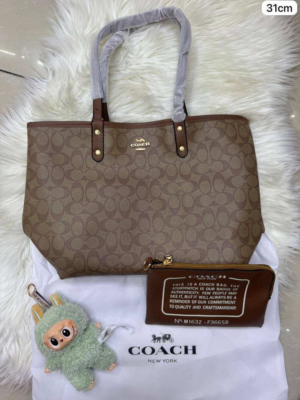 💕 Coach 2 in 1  2️⃣-sided
1️⃣ First quality
Medium Size : 31 * 28 cm
95 dhs✅

Zain115
♥️♥️♥️