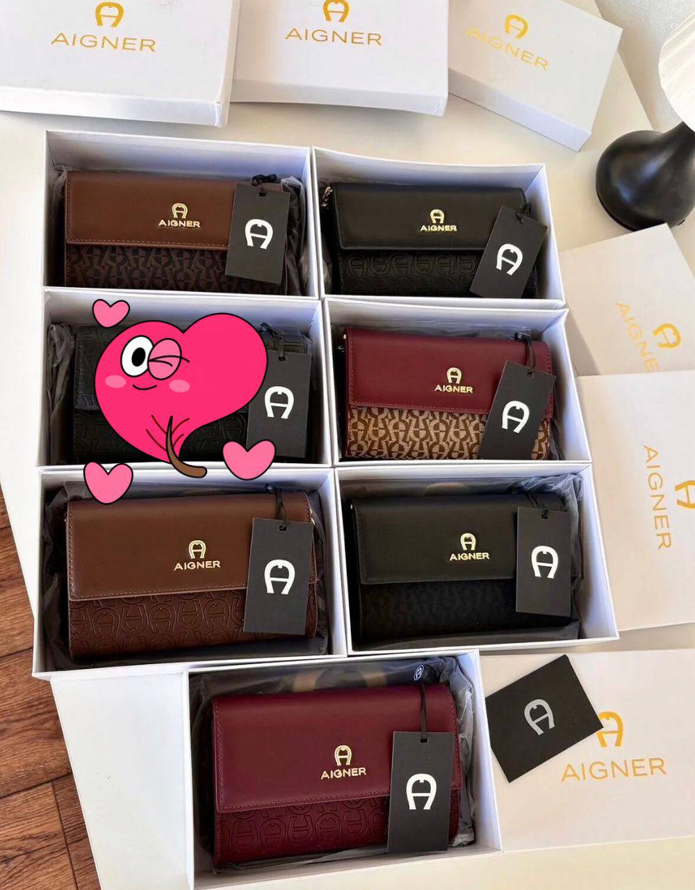 Aigner
90 dhs🪙🖤
size：20cm

Zain35
♥️♥️♥️