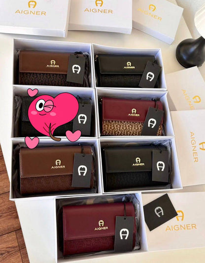 Aigner
90 dhs🪙🖤
size：20cm

Zain35
♥️♥️♥️