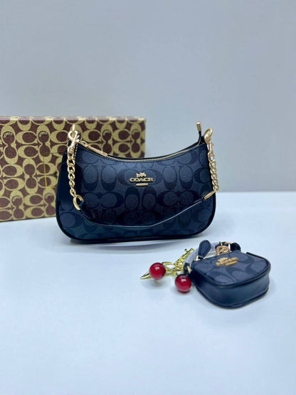 Coach
110 dhs✅
with box
🎁🎁🎁
size 25×7×15cm
with small bag and cherry

Zain42
♥️♥️♥️