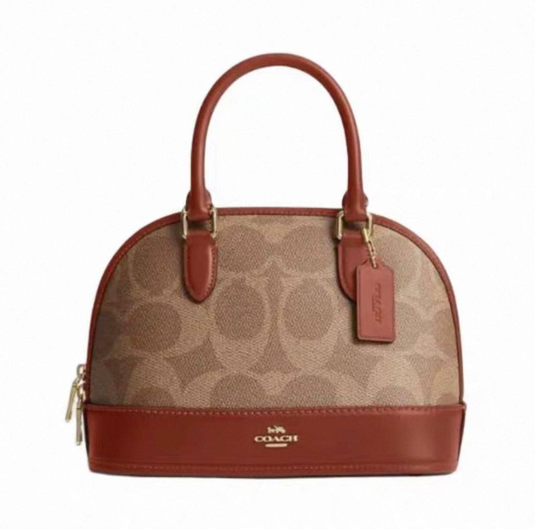 Coach
105 dhs❣️
SIZE：20cm
High-quality 

with box
🎁🎁🎁

Zain35
♥️♥️♥️