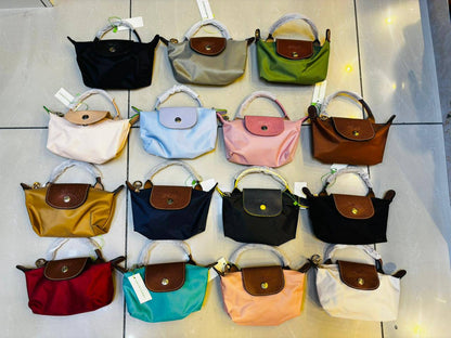longcharmp mini bag, 
good quality. Size 17 * 13 cm
50 dhs❣️

Zain12
♥️♥️♥️