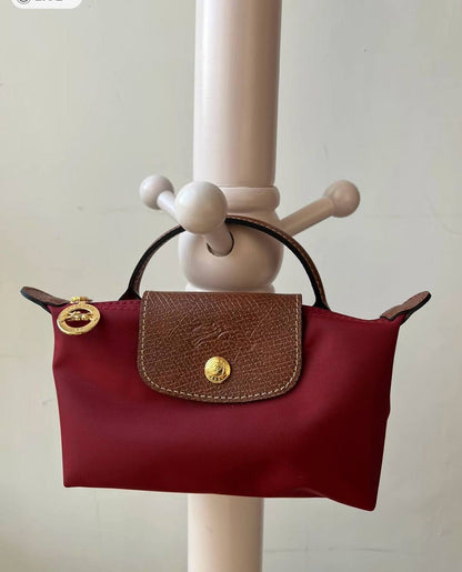 Long champ 

mini
Size: 17cm
45 dhs💓

Zain50
♥️♥️♥️