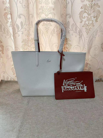 🌟 LACOSTE 🐊 New 2 in 1
✌🏻Double-sided usable bag
1⃣️First quality 
Size: 47 * 29 cm
90 dhs💓

Zain115
♥️♥️♥️