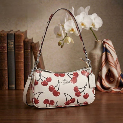 COACH Teri in Cherry Charms
In signature Canvas
Gold and silver hardware
Size : 24 cm
With BOX

CHERRY WHITE PRICE : *90 dhs✅ 

COACH with Small Bag
95 dhs✅

Zain239
♥️♥️♥️