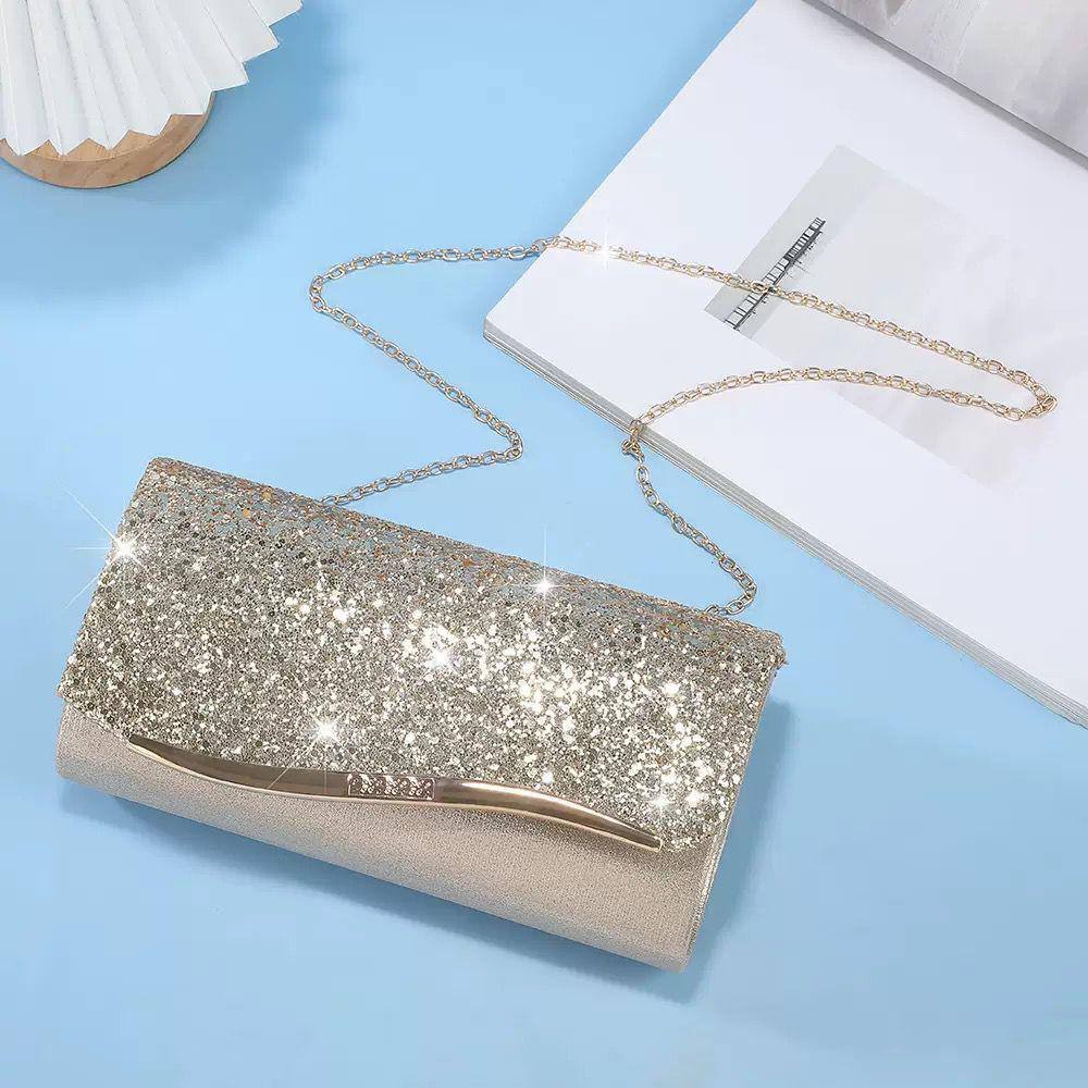 🌟 Wedding clutch bag 
Good quality 
Size: 25 * 11 cm
40 dhs❤️

Zain115
♥️♥️♥️