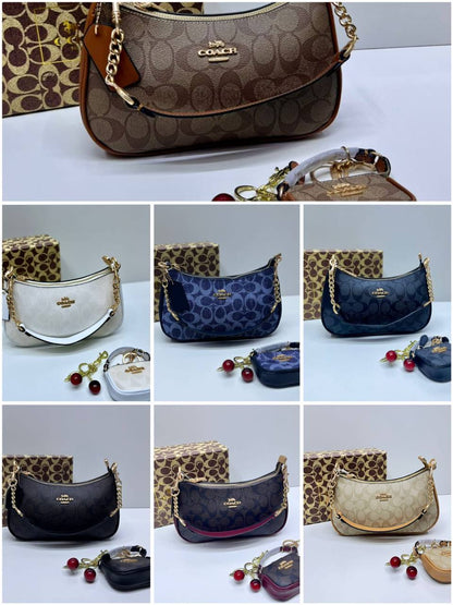 Coach
110 dhs✅
with box
🎁🎁🎁
size 25×7×15cm
with small bag and cherry

Zain42
♥️♥️♥️