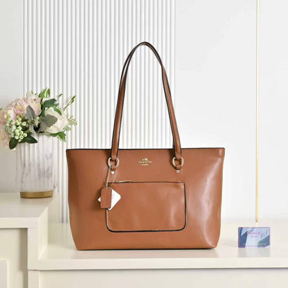 Coach 
85 dhs✅
size 43×10×26cm

Zain42
♥️♥️♥️