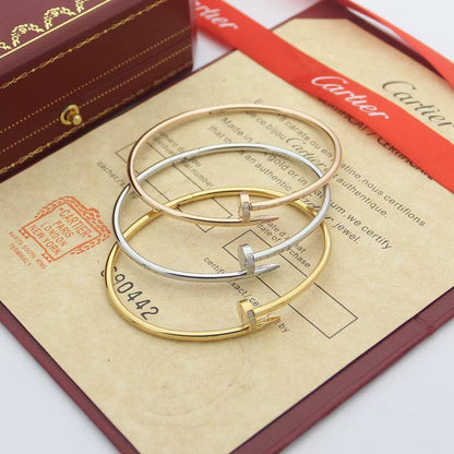 Cartier
55 dhs🗽 
BANGLE💫✨

NAIL 
WITH BOX AND PAPER BAG 🛍️🎁

Zain89
♥️♥️♥️