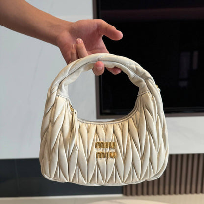 Brand: Miu MiU
Model:Wander Matelassé Hobo Bag
Material:Matelasse Kappa Leather
Hardware:Gold-tone metal
Closure:Zipper closure
Handle:Single top handle
Style:Mini Hobo Bag
Size:20cm
Quality:super master👌🏼🧶

For Price 👇 WhatsApp✅
0568585901 
050755737