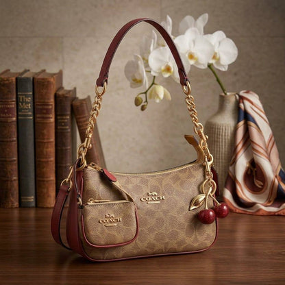 COACH Teri in Cherry Charms
In signature Canvas
Gold and silver hardware
Size : 24 cm
With BOX

CHERRY WHITE PRICE : *90 dhs✅ 

COACH with Small Bag
95 dhs✅

Zain239
♥️♥️♥️