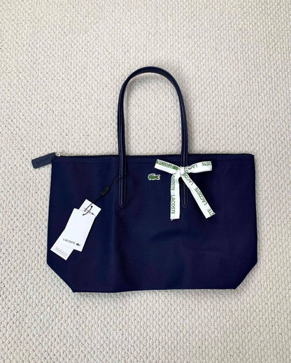 Lacoste
size 45 cm 
55 dhs❣️

Zain12
♥️♥️♥️