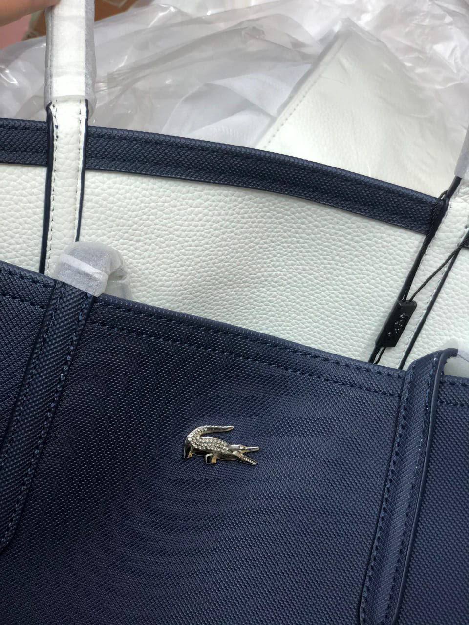 Lacoste 
75 dhs💓
size 47×13×28cm

Zain42
♥️♥️♥️