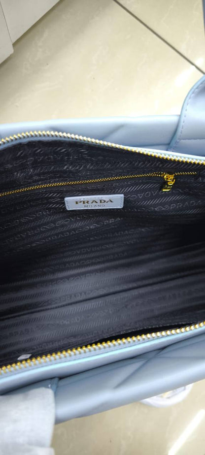 PRADA Symbole Handbag
Soft calfskin leather 
with a distinct triangle
quilted design and
gold-tone hardware
Size : 36 cm

100 dhs🇦🇪🇦🇪

Zain239
♥️♥️♥️