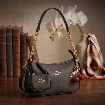 COACH Teri in Cherry Charms
In signature Canvas
Gold and silver hardware
Size : 24 cm
With BOX

With CHERRY 
95 dhs💓

COACH with Small Bag
95 dhs💓

Zain239
♥️♥️♥️