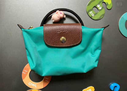 Long Champ mini 
Size：17cm
50 dhs🇦🇪🇦🇪

Zain136
♥️♥️♥️