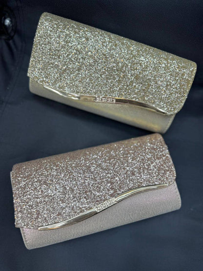 🌟 Wedding clutch bag 
Good quality 
Size: 25 * 11 cm
40 dhs❤️

Zain115
♥️♥️♥️