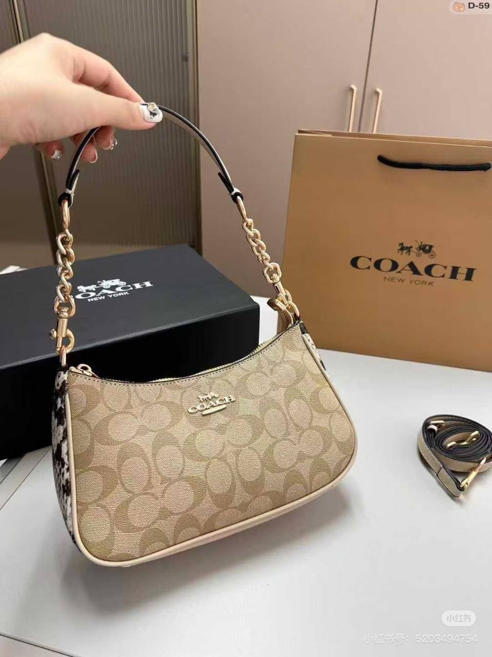 🌈 Coach Teri
1️⃣ First quality +🎁
Size : 24 * 15 * 7 cm
80 dhs🪙🌨️
with box 🎁

Zain115
♥️♥️♥️