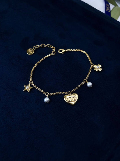 DIOR 🤍
* *New Collection*  
* The CD Charms with Logo®️& Pearl Hanging full Set 
* ⁠Necklace 
* ⁠Earings
* ⁠Bracelet 
↗️ *Super Master Quality ®️*
*260 dhs🪙💚* with *Normal* Box & Bag
*275 dhs🪙💚* with *Orignal* Packaging

Zain106
♥️♥️♥️