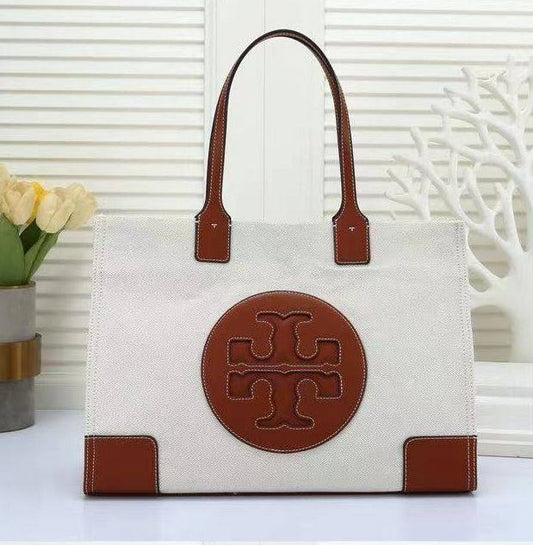 Tory  Burch
SIZE  ………42CM 🥰
95 dhs🪙🌨️

Zain244
♥️♥️♥️