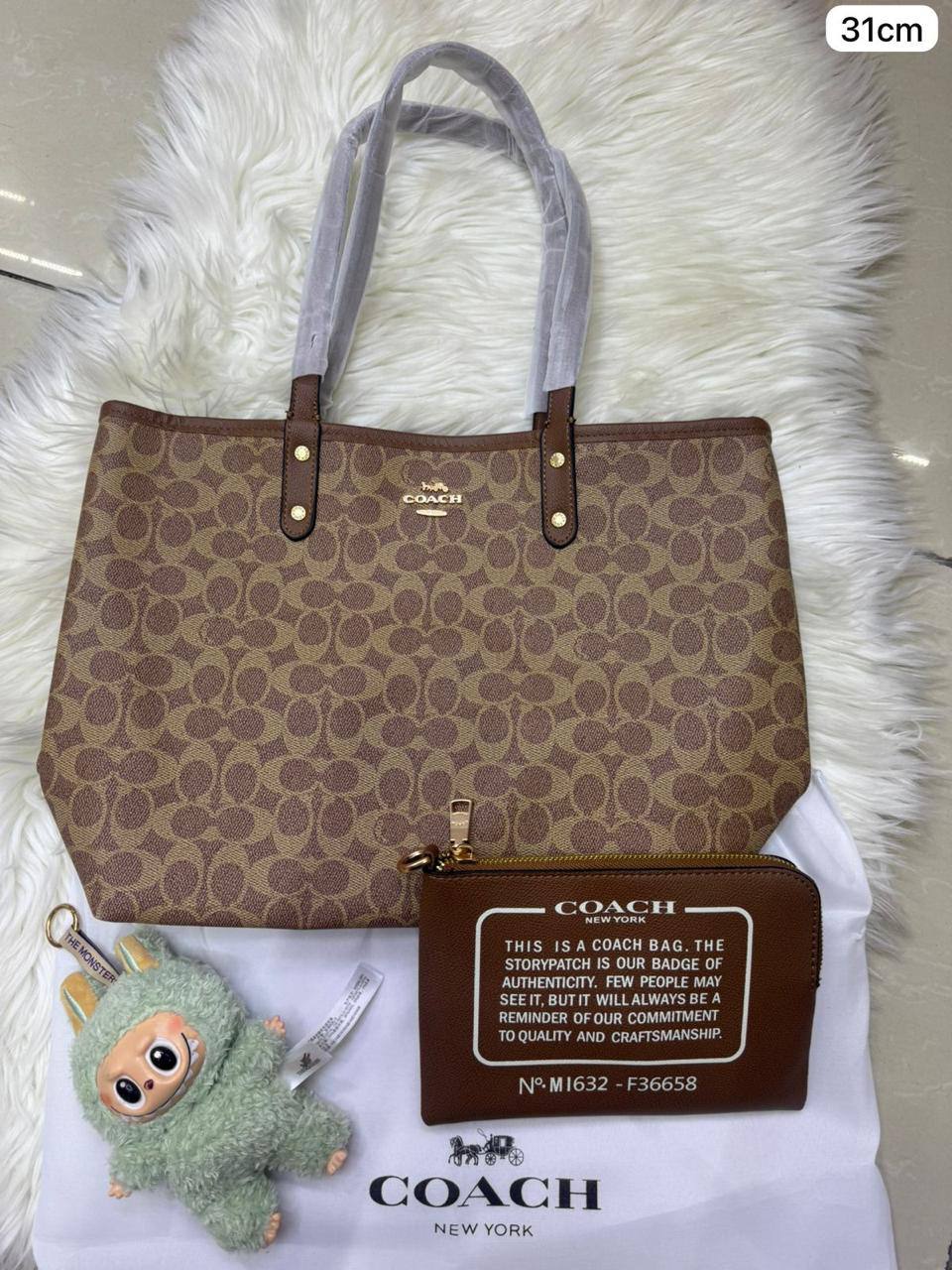 💕 Coach 2 in 1  2️⃣-sided
1️⃣ First quality
Medium Size : 31 * 28 cm
95 dhs✅

Zain115
♥️♥️♥️