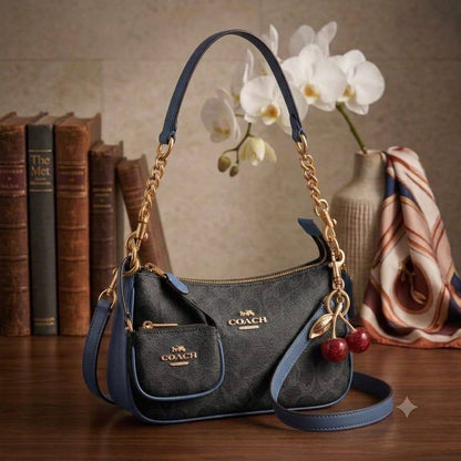 COACH Teri in Cherry Charms
In signature Canvas
Gold and silver hardware
Size : 24 cm
With BOX

With CHERRY 
95 dhs💓

COACH with Small Bag
95 dhs💓

Zain239
♥️♥️♥️